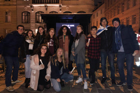 Group of people celebrating on stage