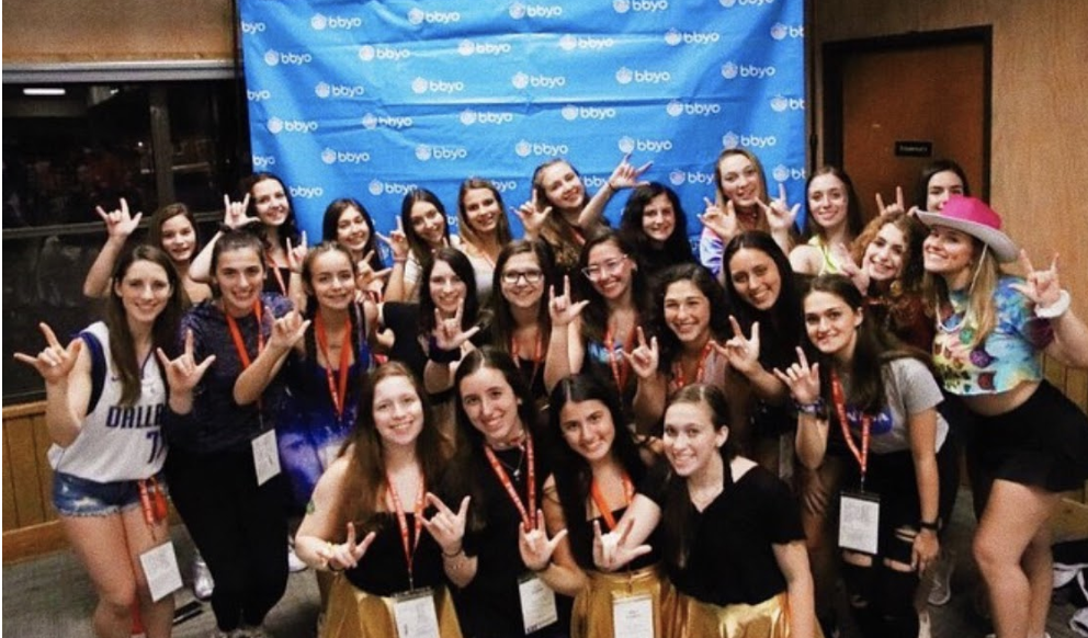 Group of people celebrating on stage