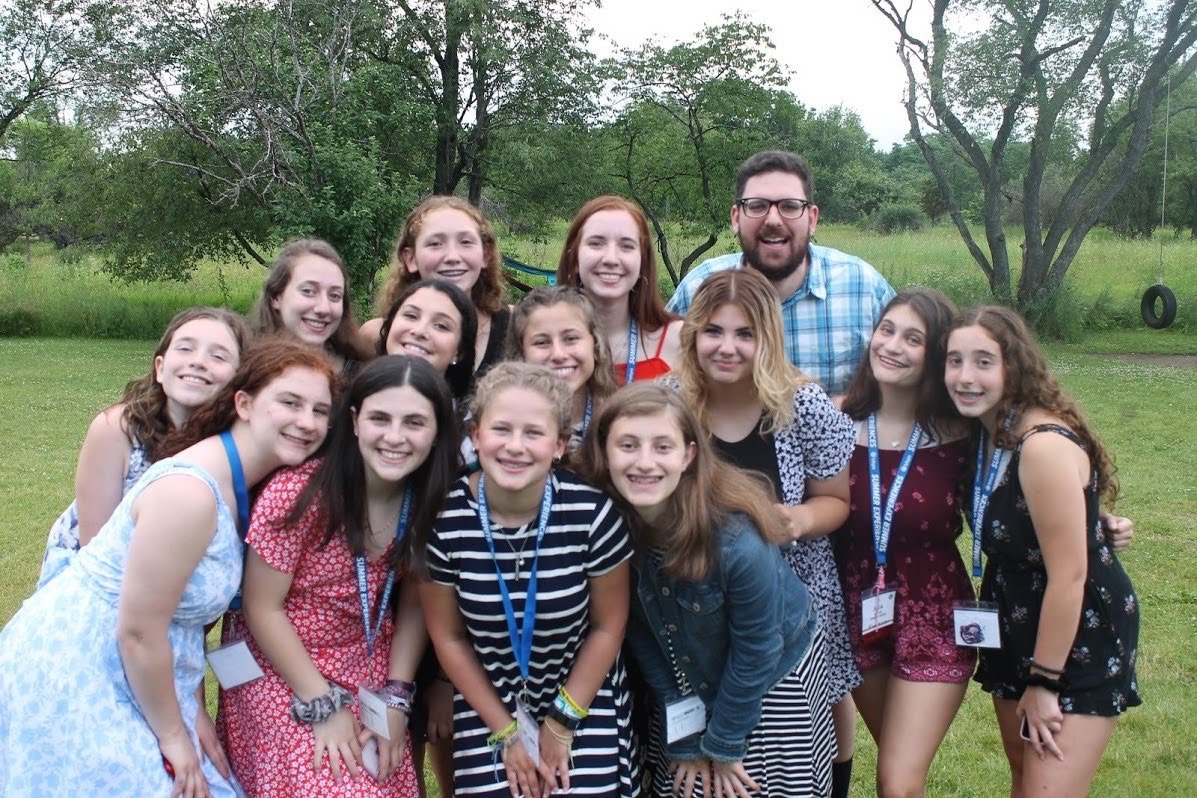 Group of people celebrating on stage