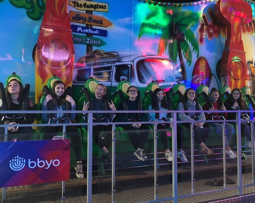 Group of people celebrating on stage