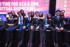 Group of people celebrating on stage