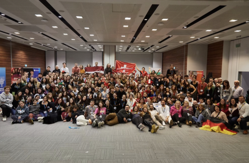 Group of people celebrating on stage