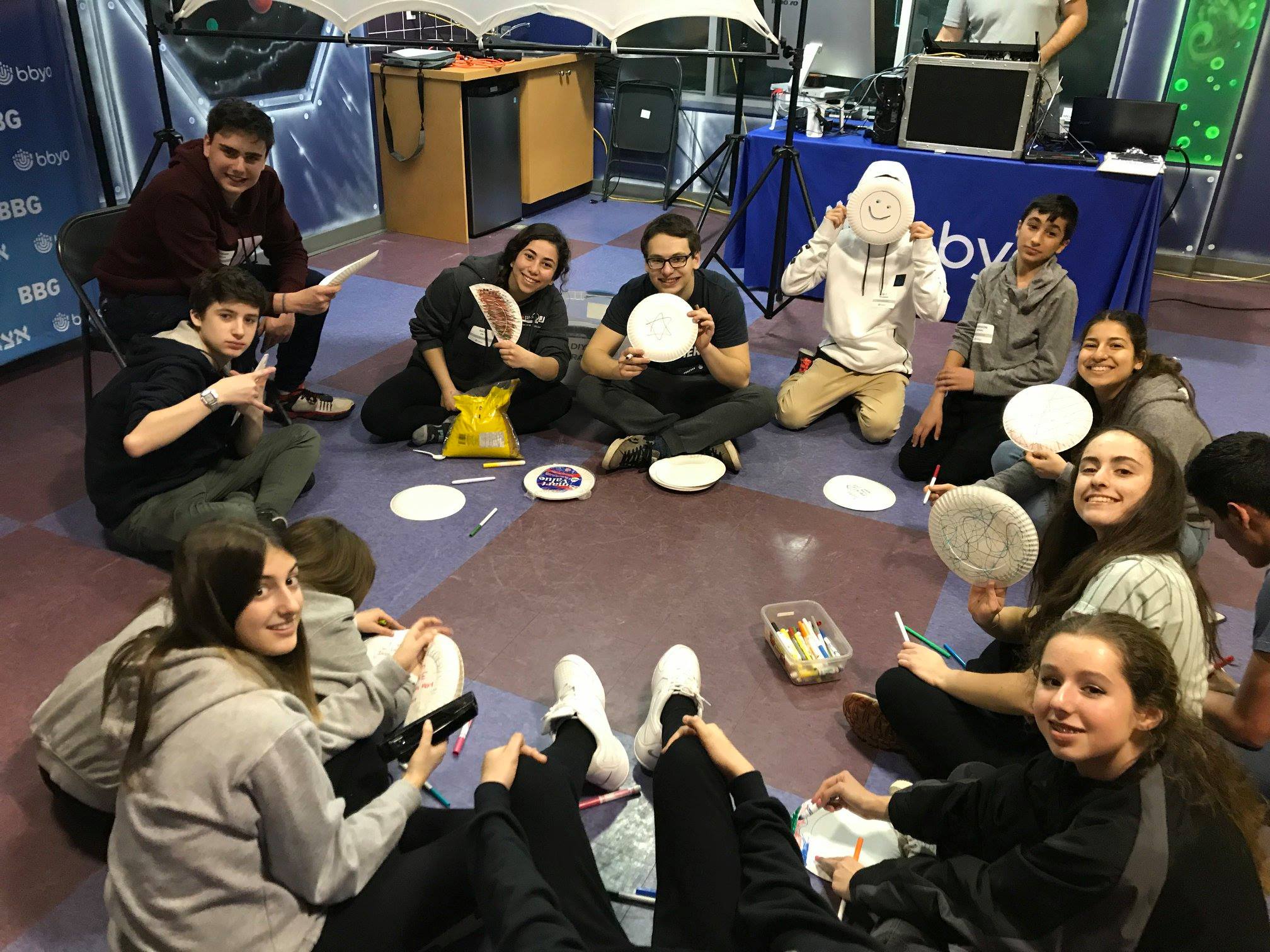 Group of people celebrating on stage