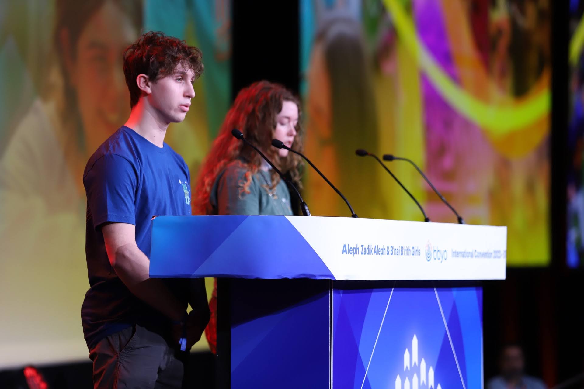 Group of people celebrating on stage