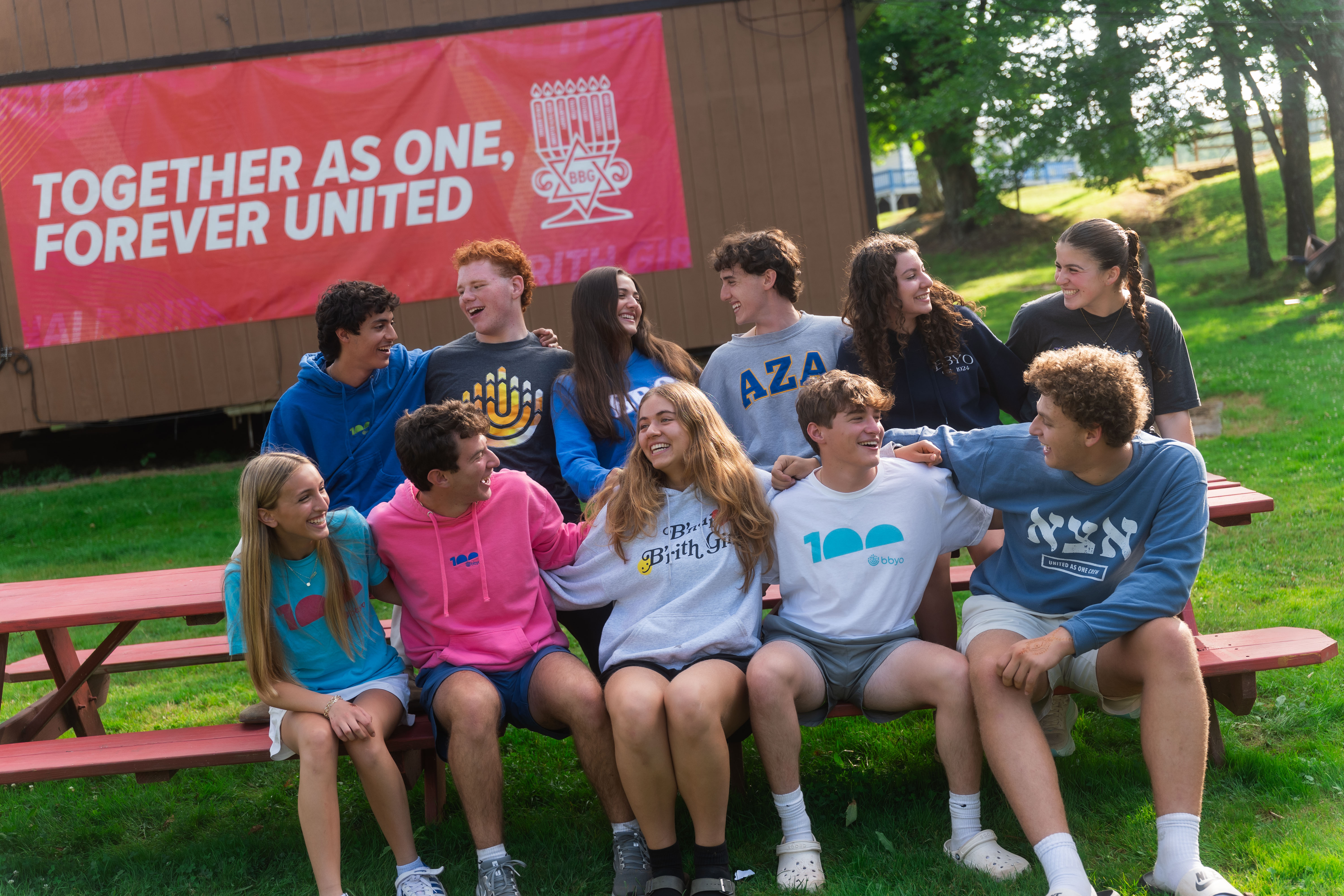 Group of people smiling outdoors