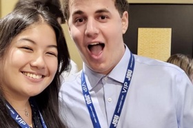 Group of people celebrating on stage