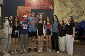 Group of people celebrating on stage