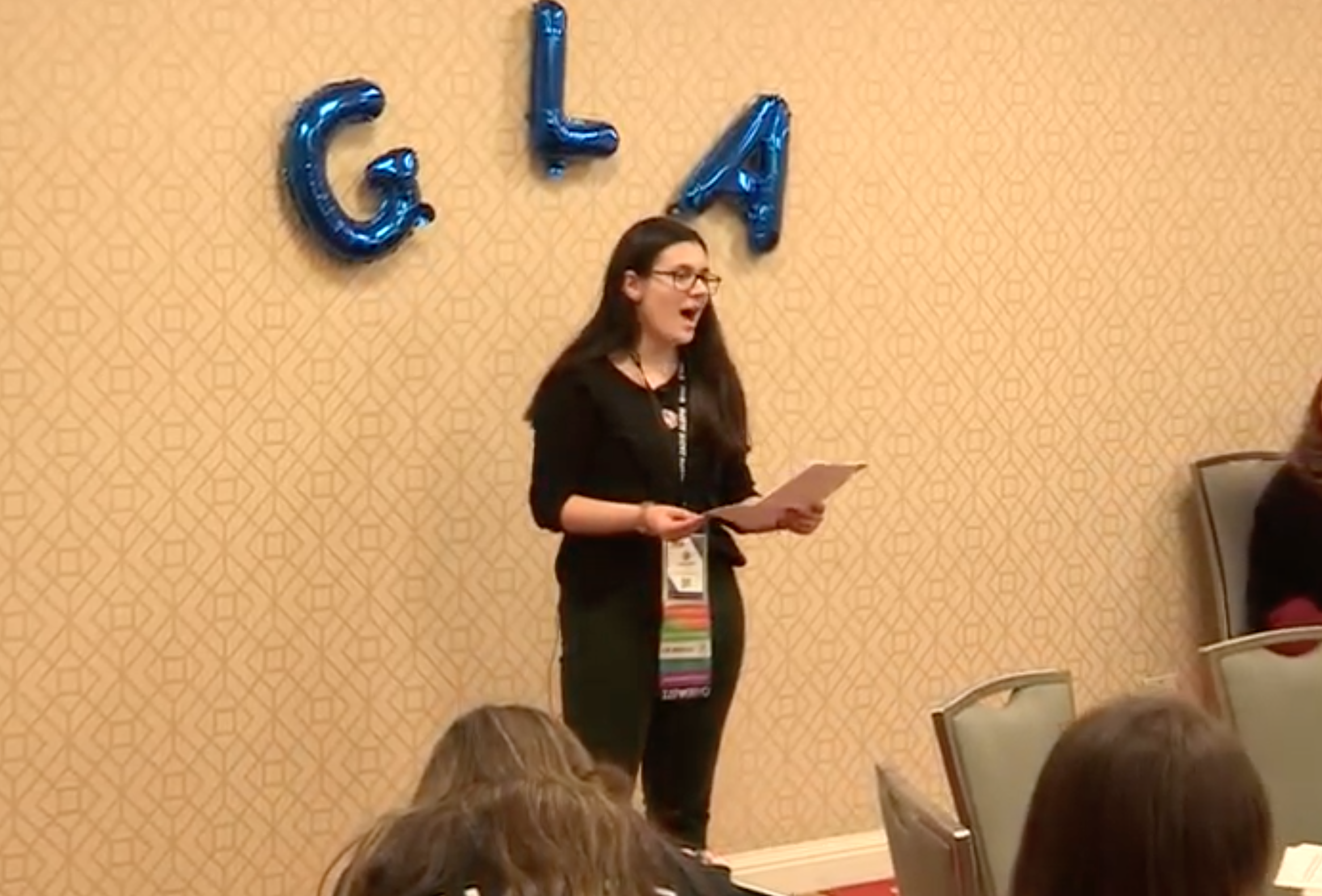 Group of people celebrating on stage
