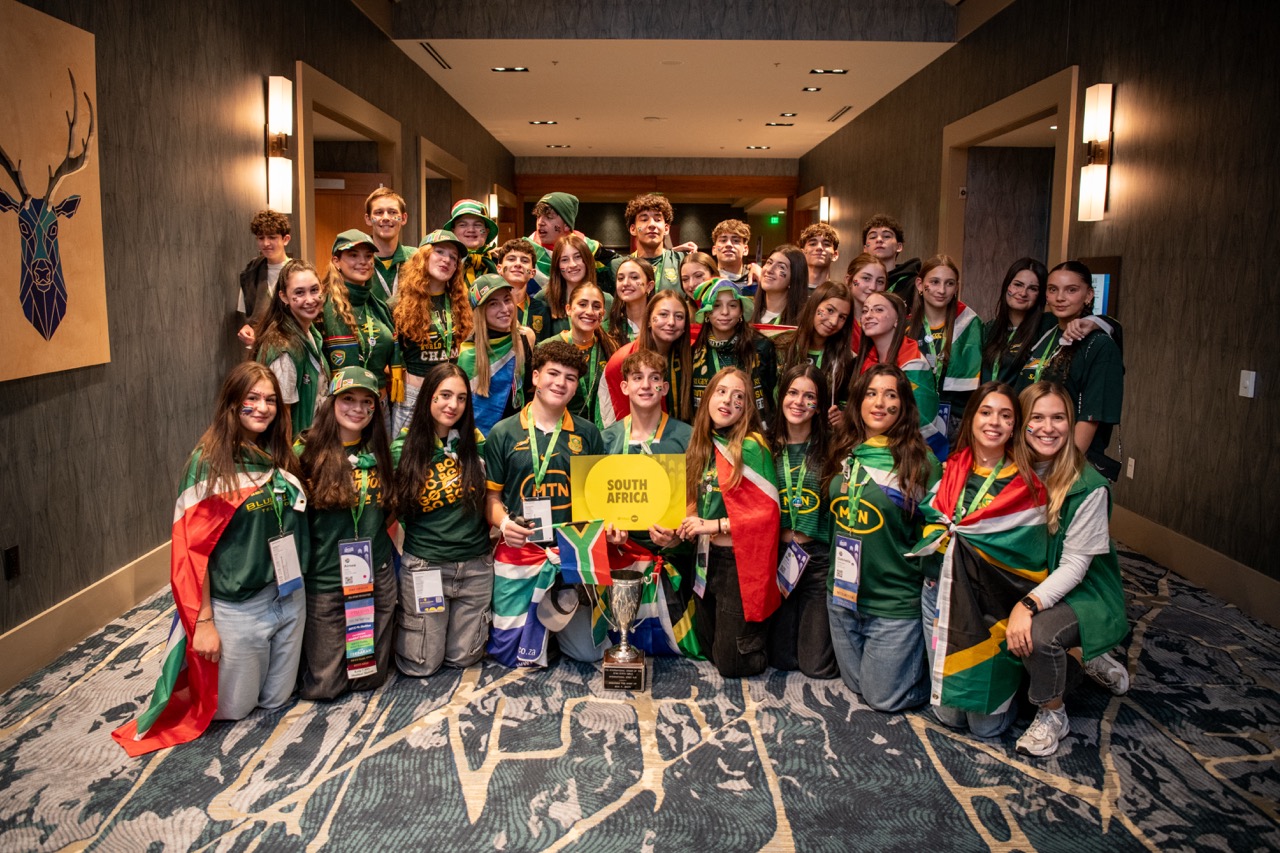 Group of people celebrating on stage