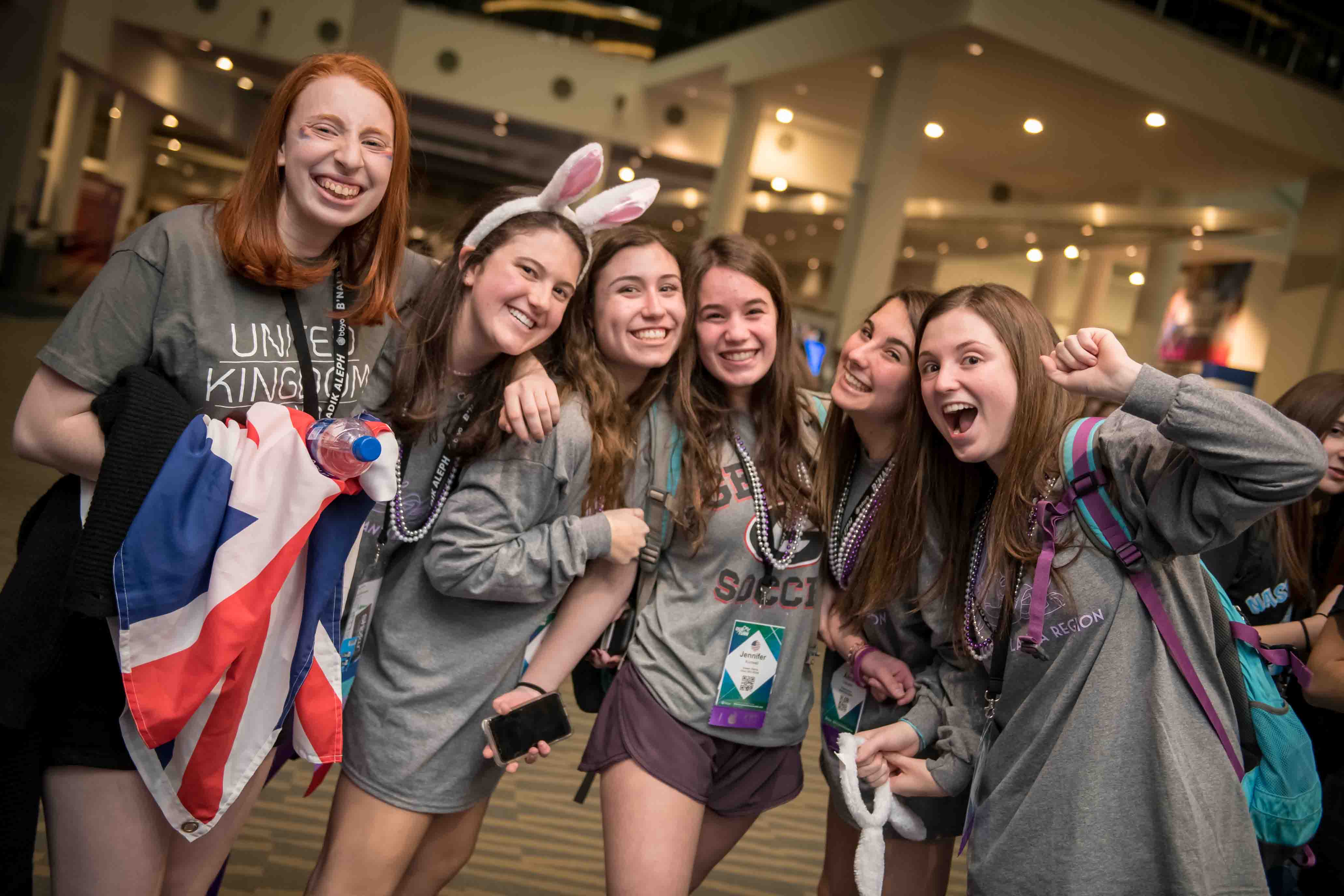 Group of people celebrating on stage