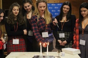 Group of people celebrating on stage