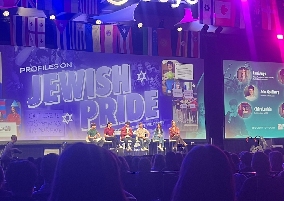 Group of people celebrating on stage