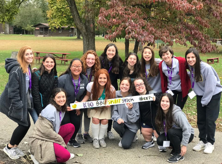 Group of people celebrating on stage