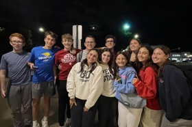 Group of people celebrating on stage