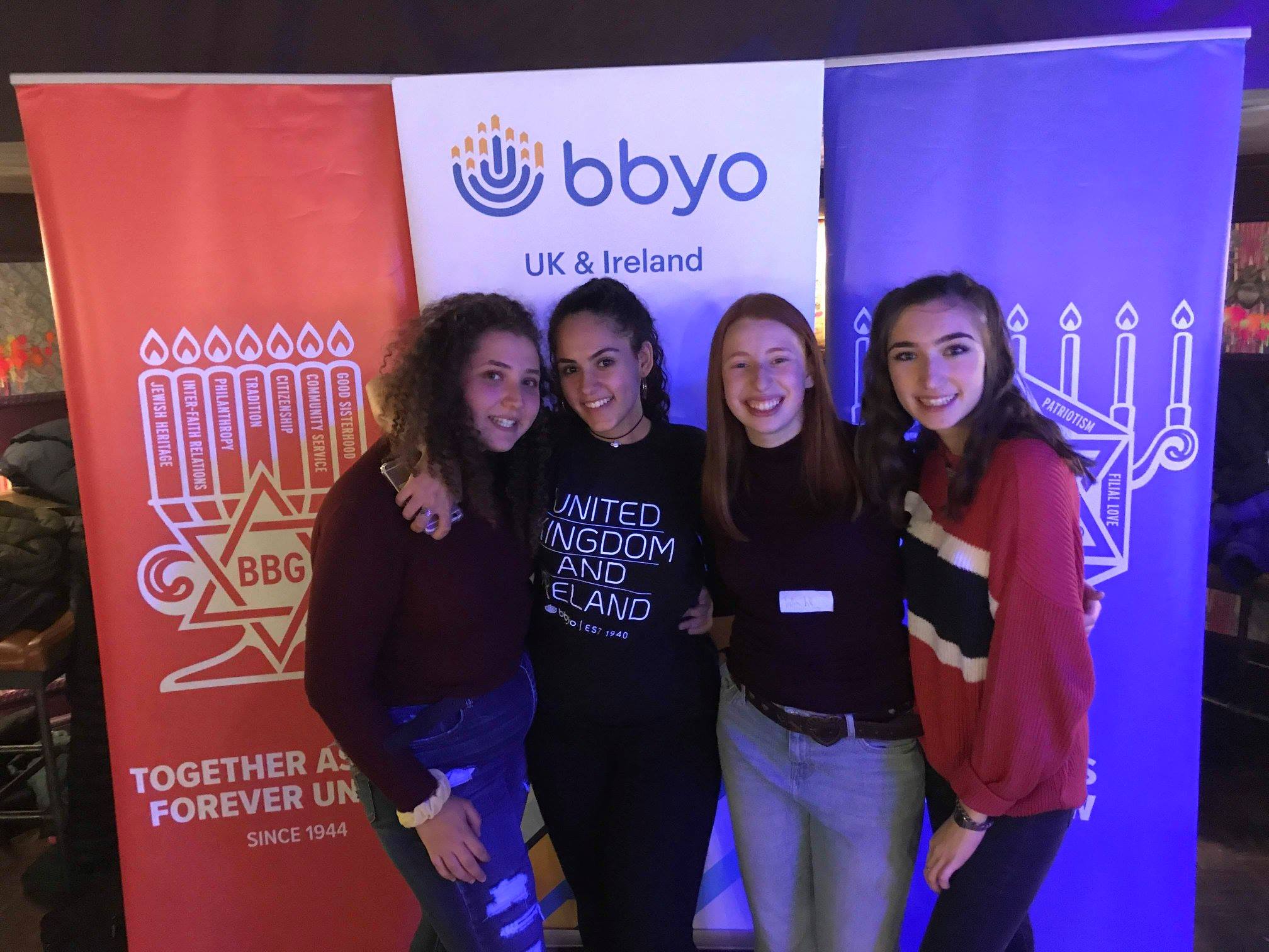 Group of people celebrating on stage