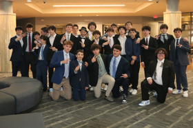 Group of people celebrating on stage