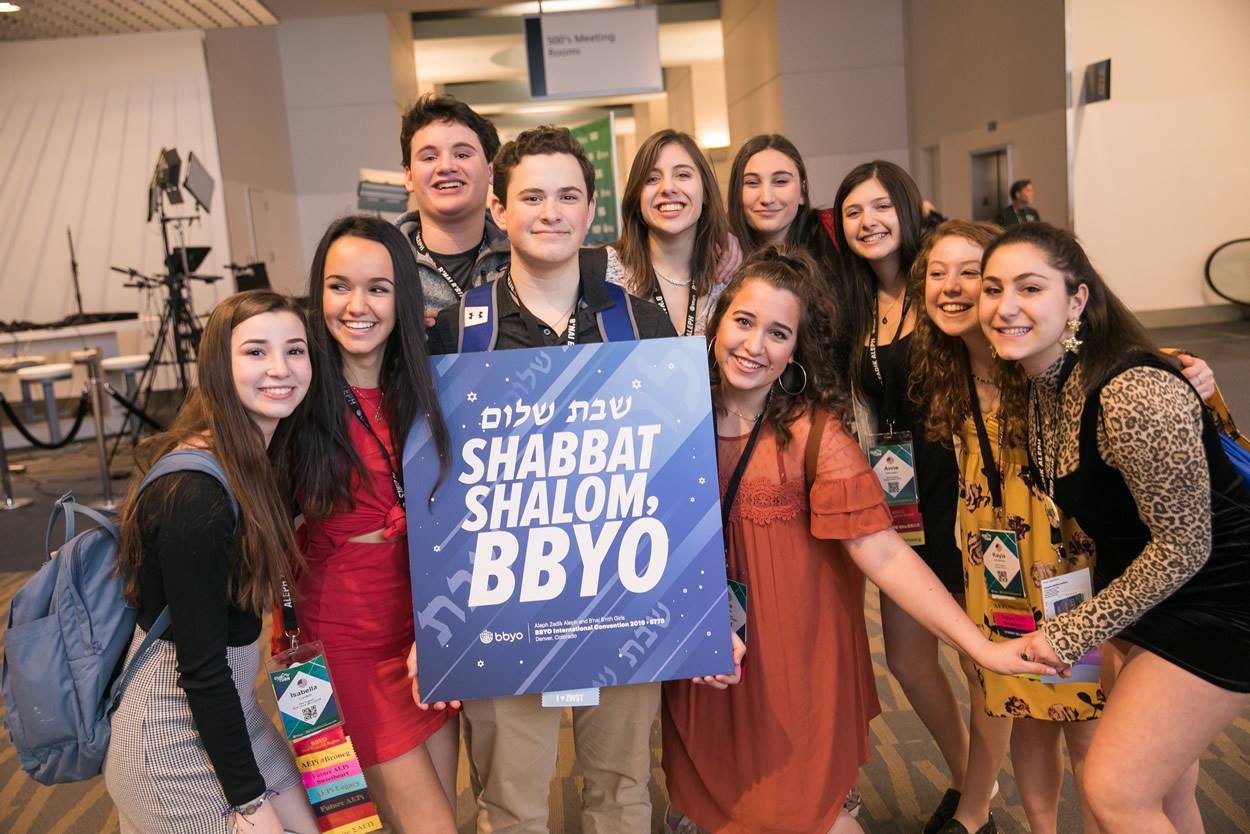 Group of people celebrating on stage