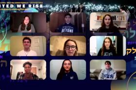 Group of people celebrating on stage