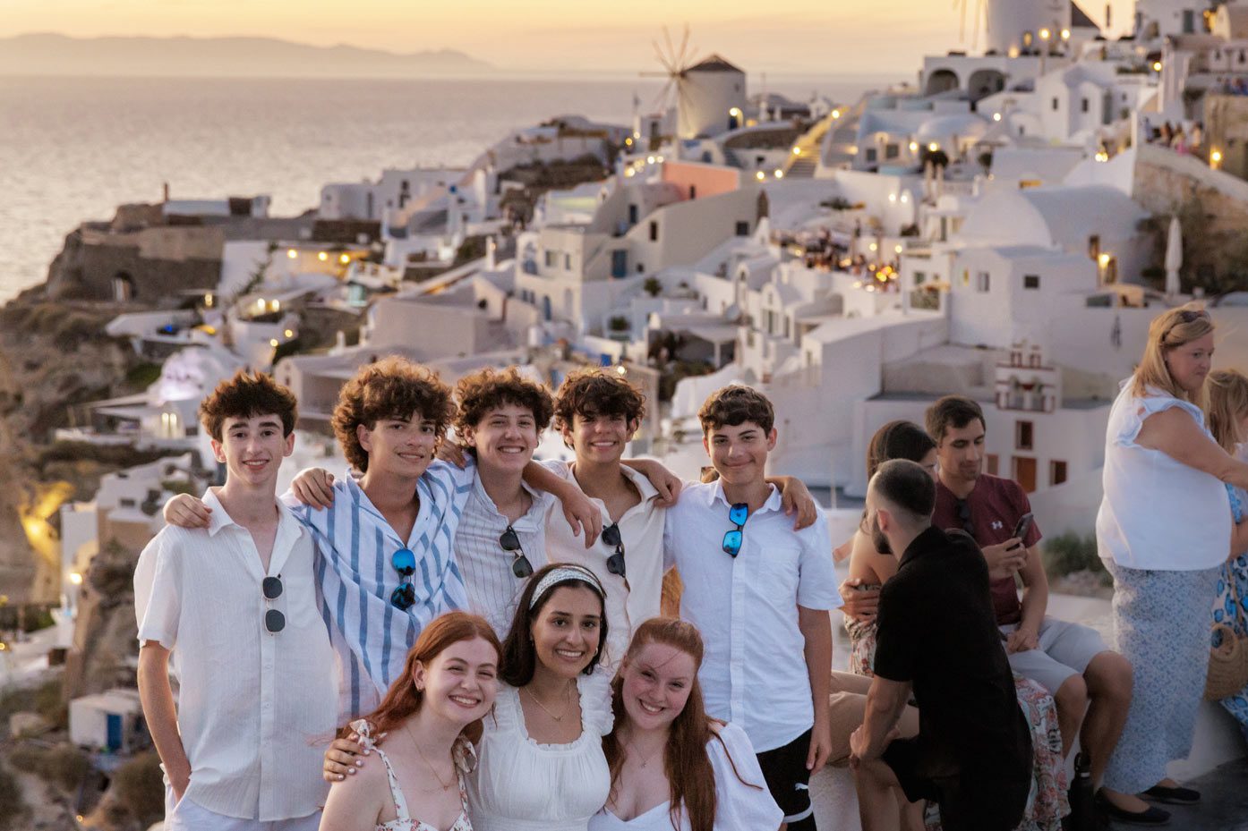 Group of diverse young people smiling at a community event